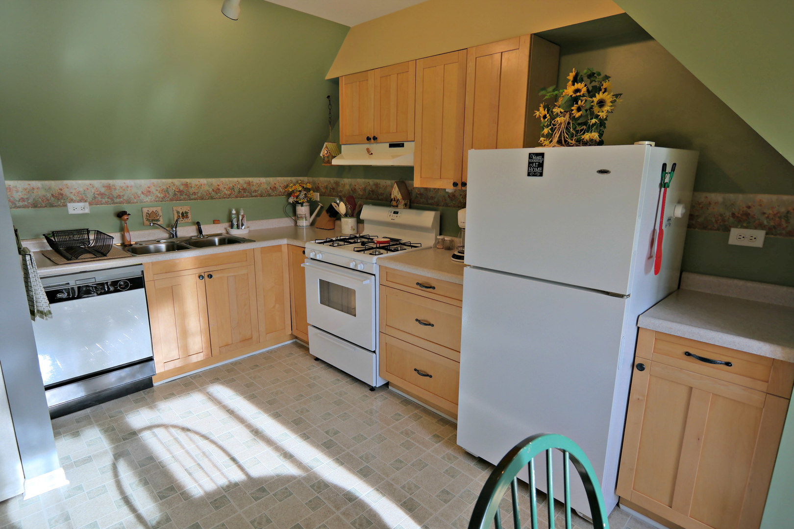 4115 Wilson Road Woodstock, IL 60098 - Photo 28 of 44 a kitchen with a stove top oven and cabinets