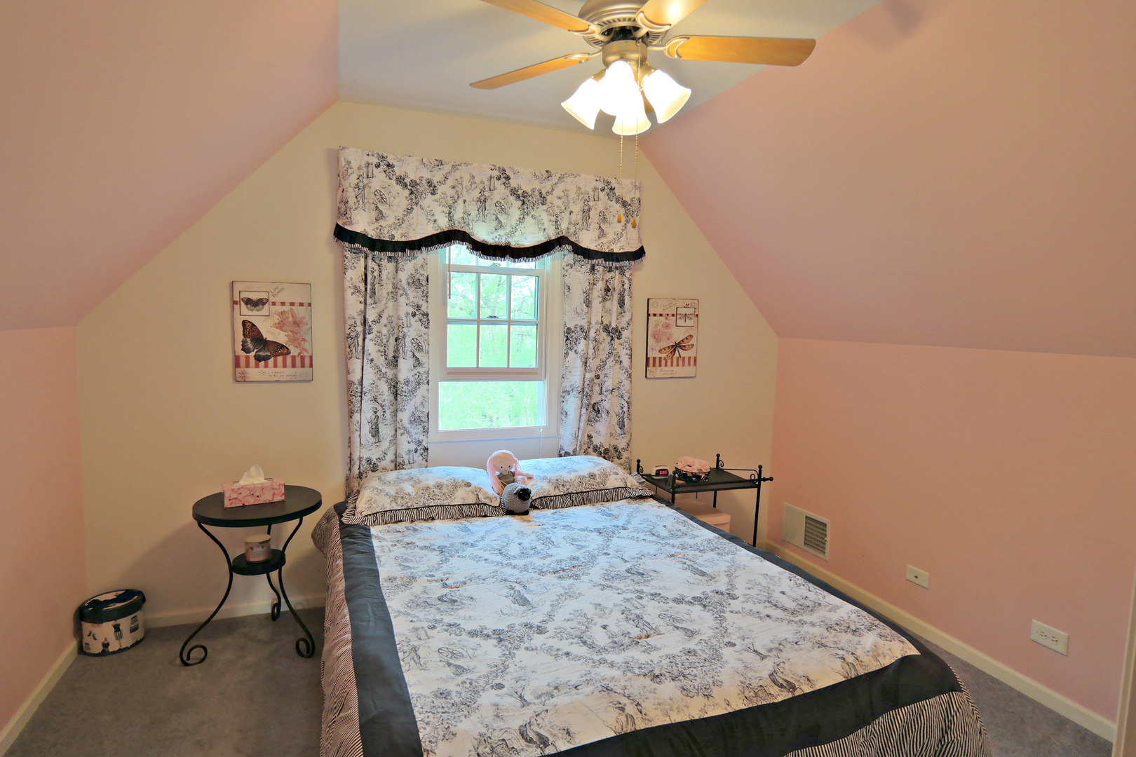 4115 Wilson Road Woodstock, IL 60098 - Photo 32 of 44 a view of a room with furniture and chandelier fan