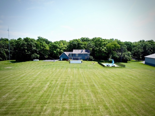 4115 Wilson Road Woodstock, IL 60098 - Photo 36 of 44 a swimming pool with plants