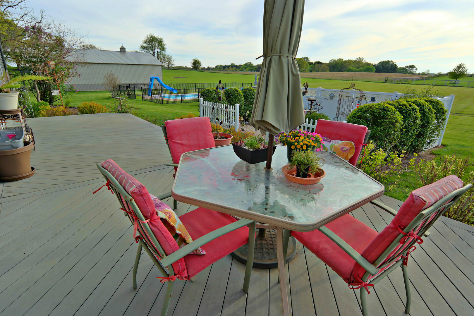 4115 Wilson Road Woodstock, IL 60098 - Photo 43 of 44 a view of a table and chairs on the roof deck