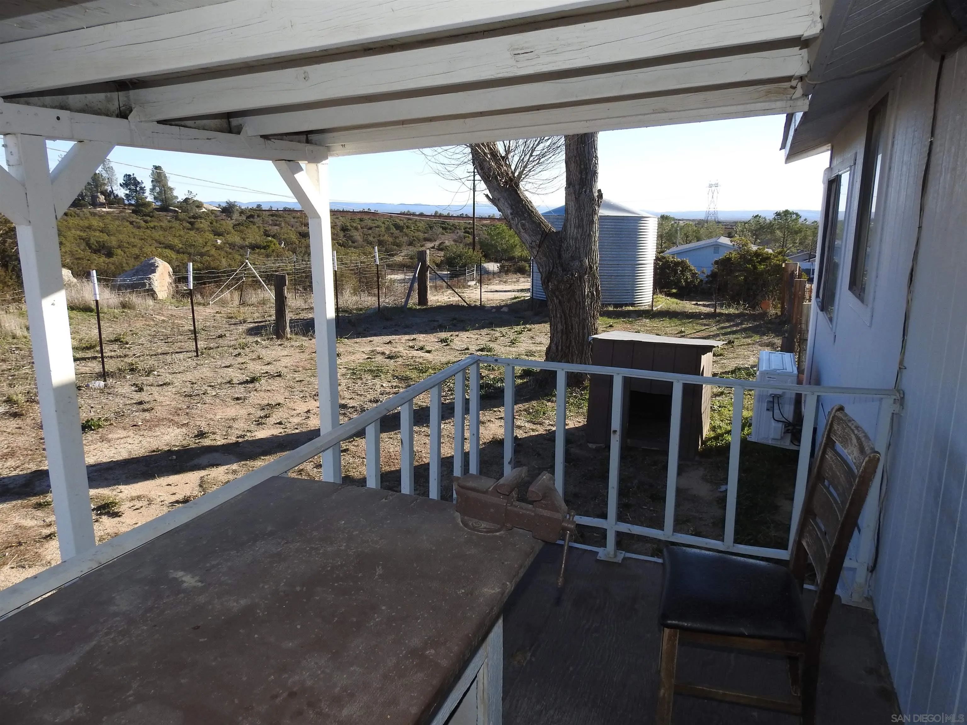 664 Tierra Del Sol Road Boulevard, CA 91905 - Photo 46 of 74 a view of a porch with chairs and backyard