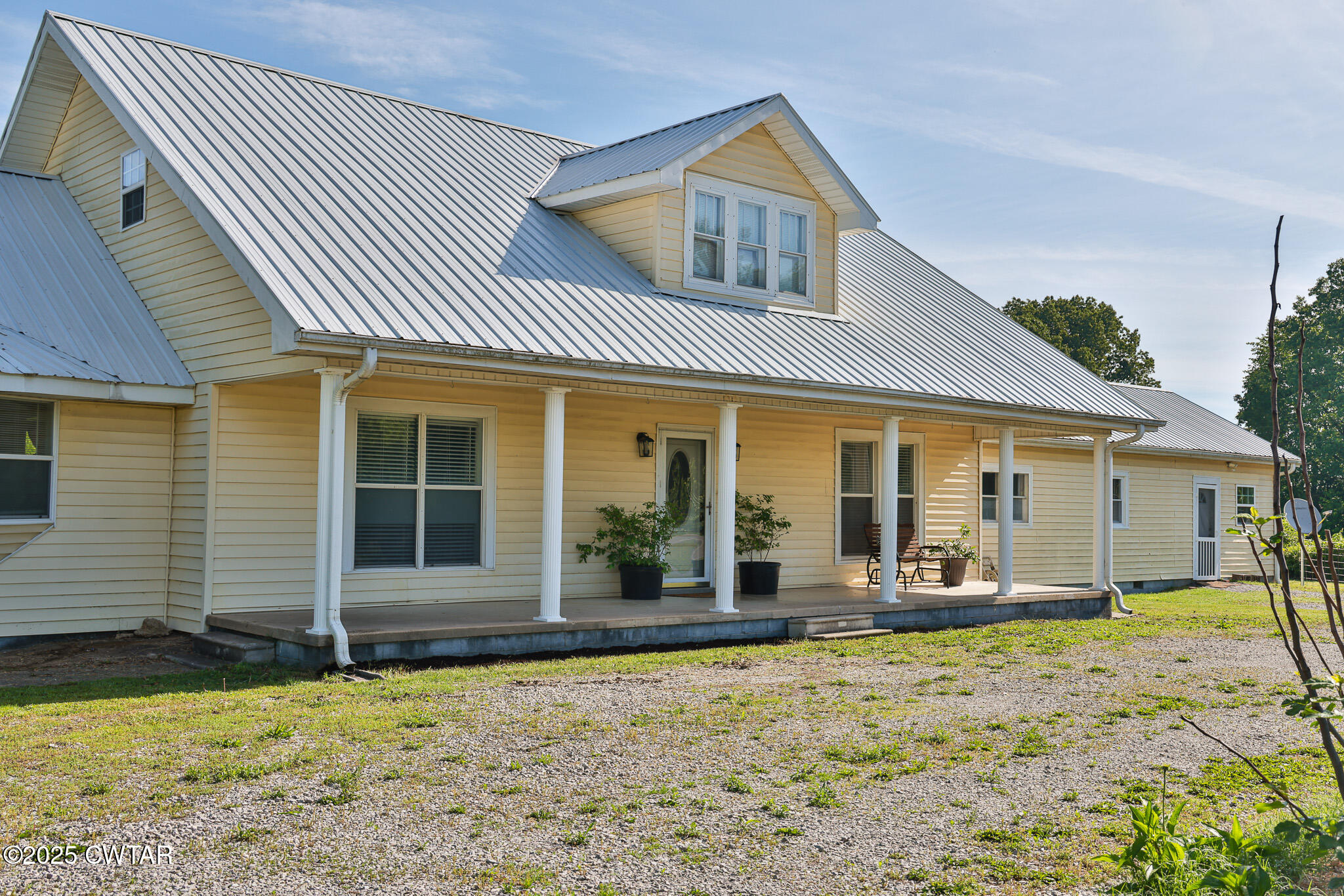 front view of a house with a patio
