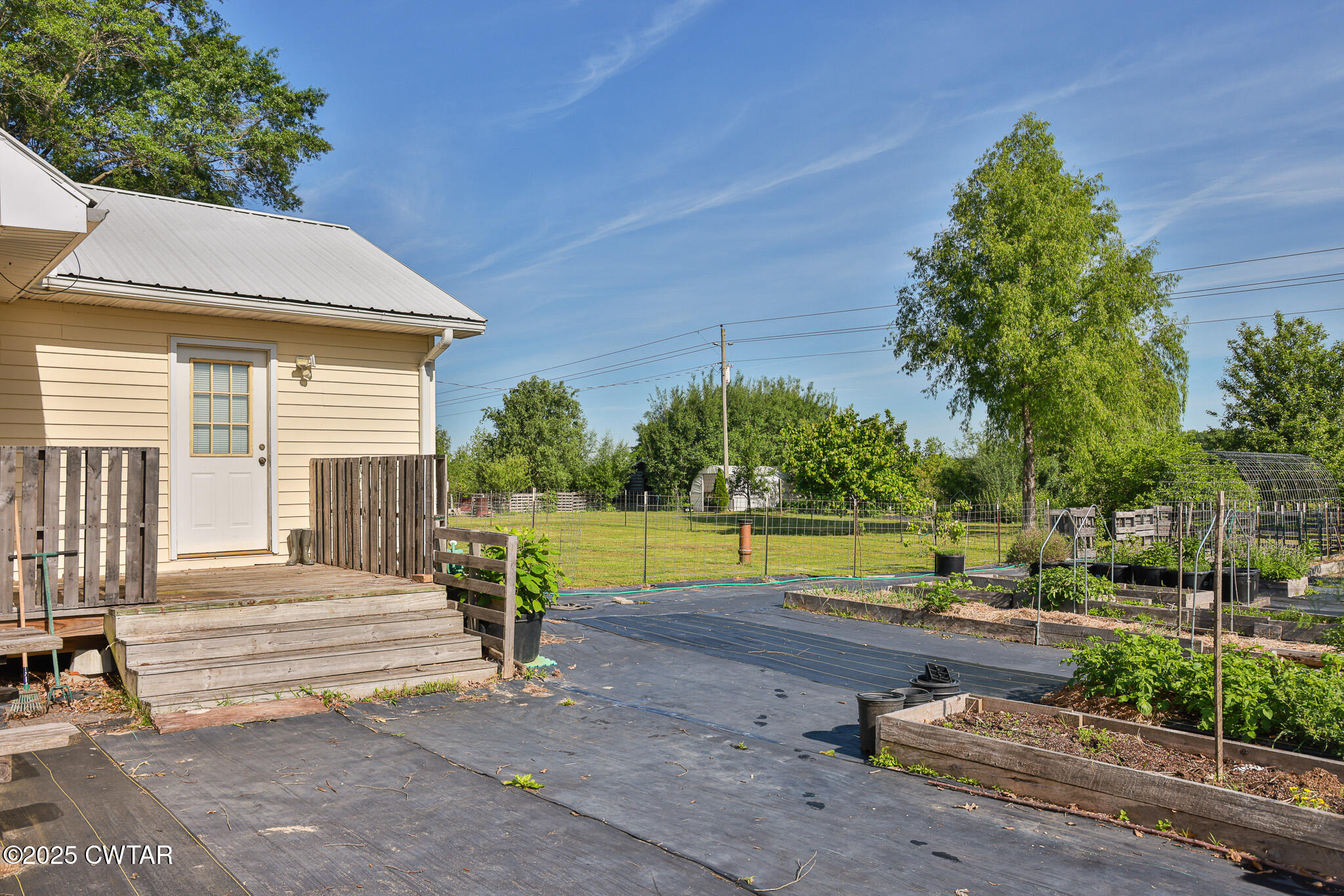 1461 Bynum Road Dresden, TN 38225 - Photo 13 of 60 a view of a house with a swimming pool