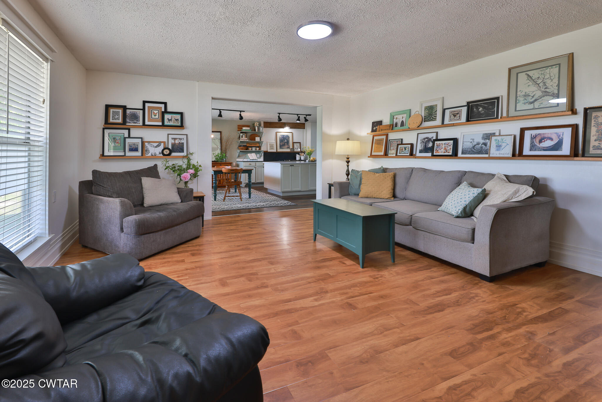 1461 Bynum Road Dresden, TN 38225 - Photo 20 of 60 a living room with furniture and a wooden floor