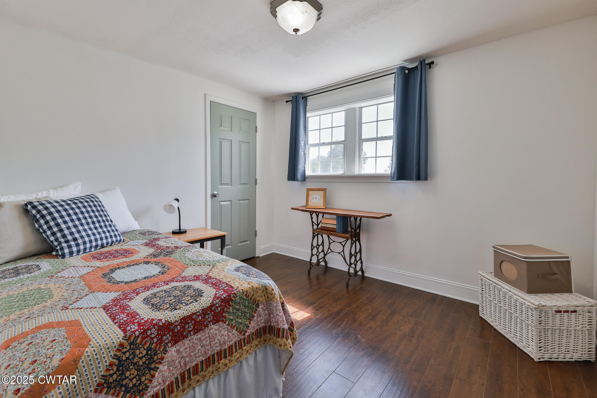 1461 Bynum Road Dresden, TN 38225 - Photo 43 of 60 a bedroom with a bed and a table