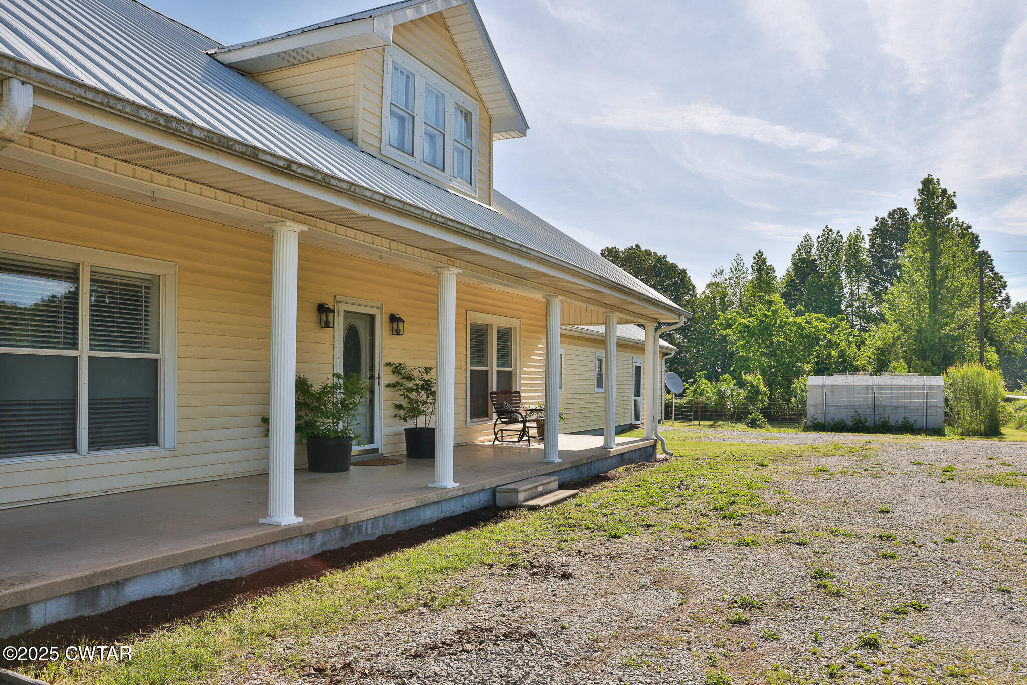 1461 Bynum Road Dresden, TN 38225 - Photo 5 of 60 a view of a house with backyard and sitting area