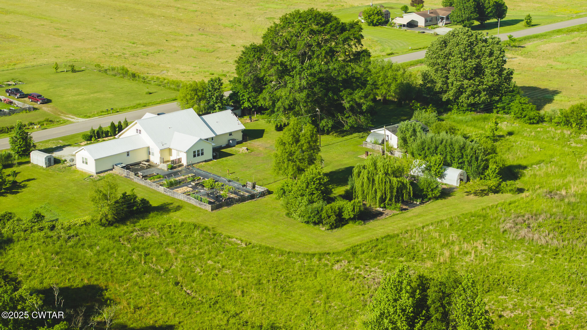 1461 Bynum Road Dresden, TN 38225 - Photo 8 of 60 a view of a garden with an ocean