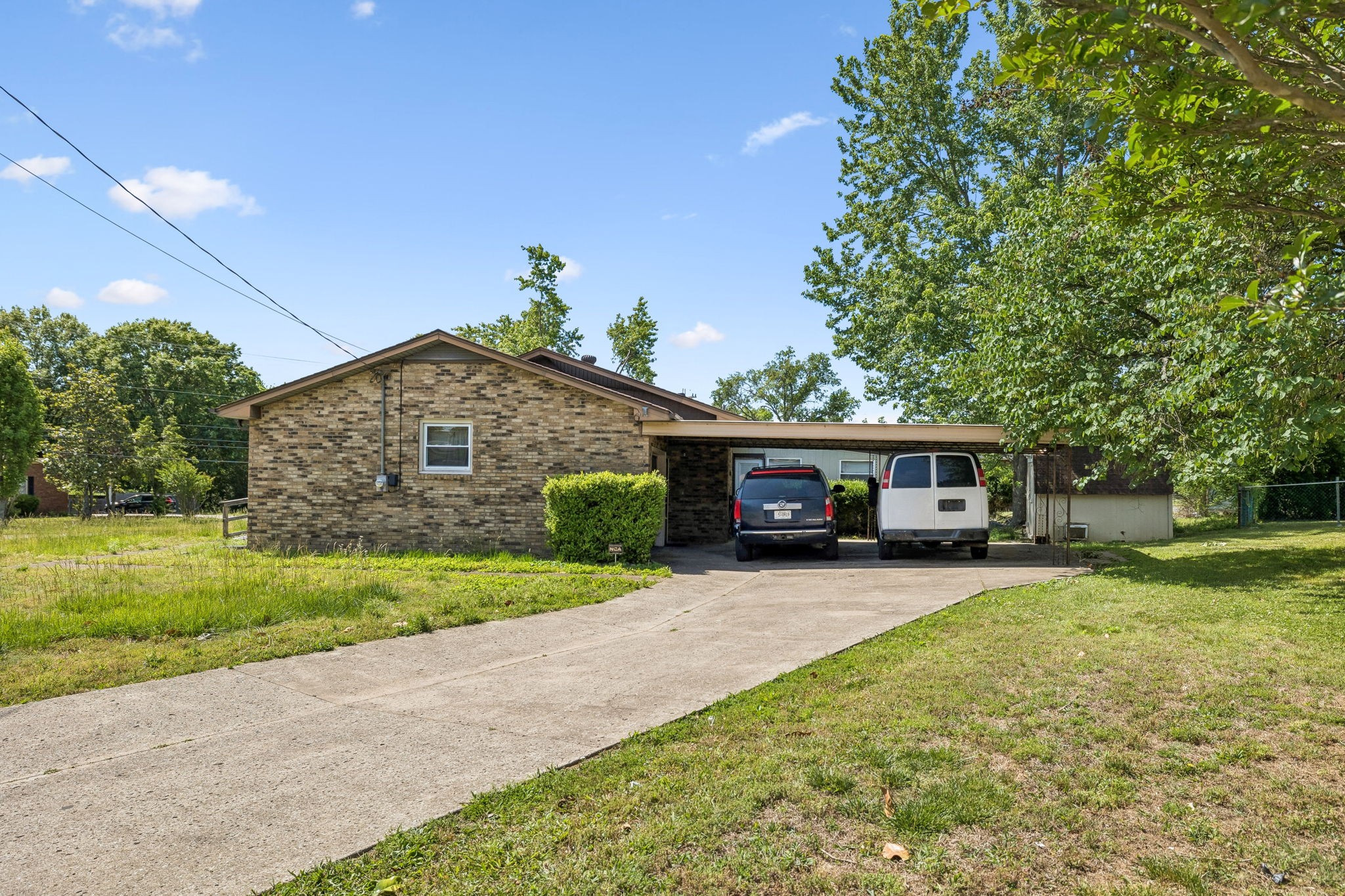 1246 Apache Lane Madison, TN 37115 - Photo 16 of 21 a front view of a house with garden