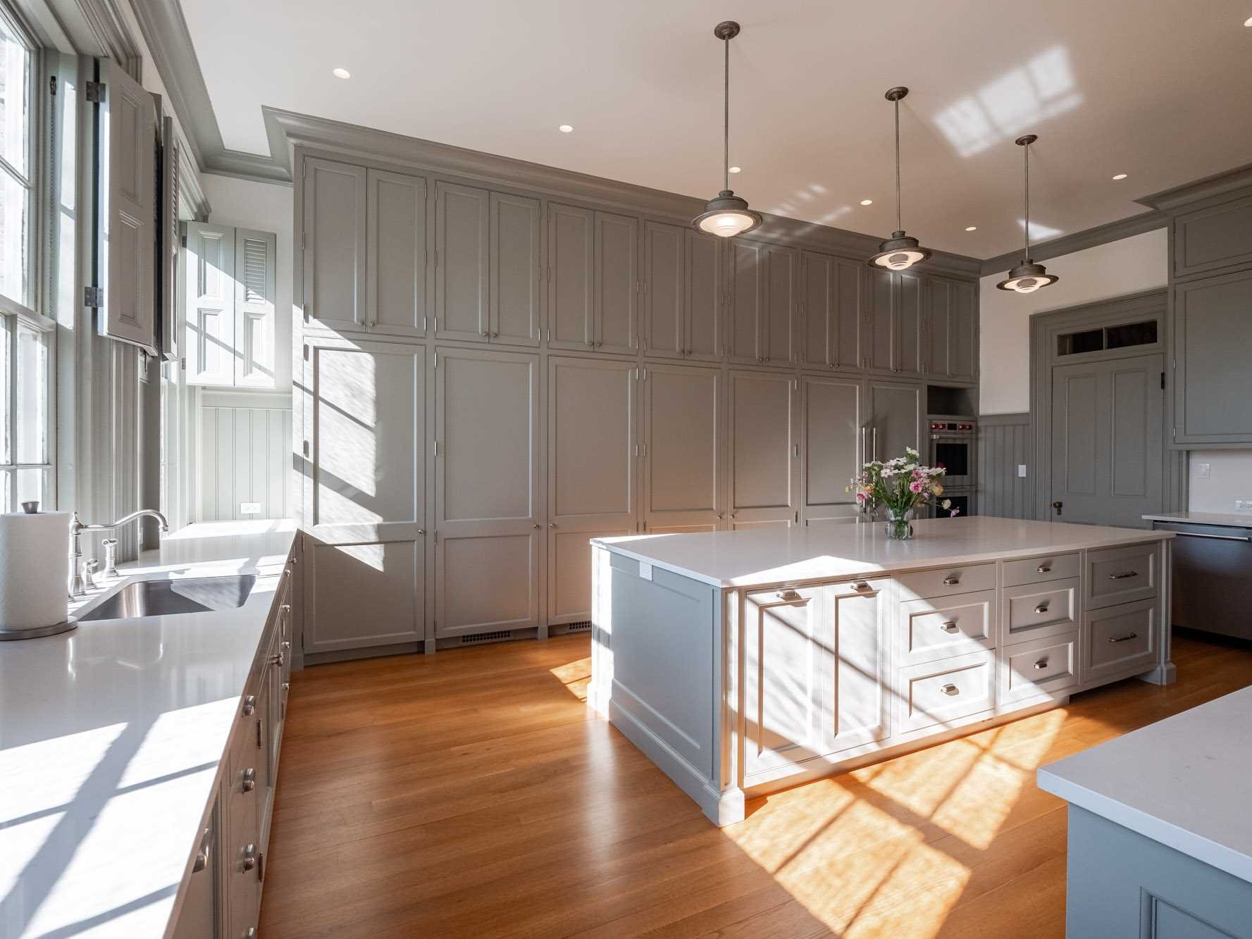 124 Eden Knoll Red Hook, NY 12571 - Photo 18 of 40 a spacious kitchen with stainless steel appliances granite countertop a sink a stove and a wooden floors