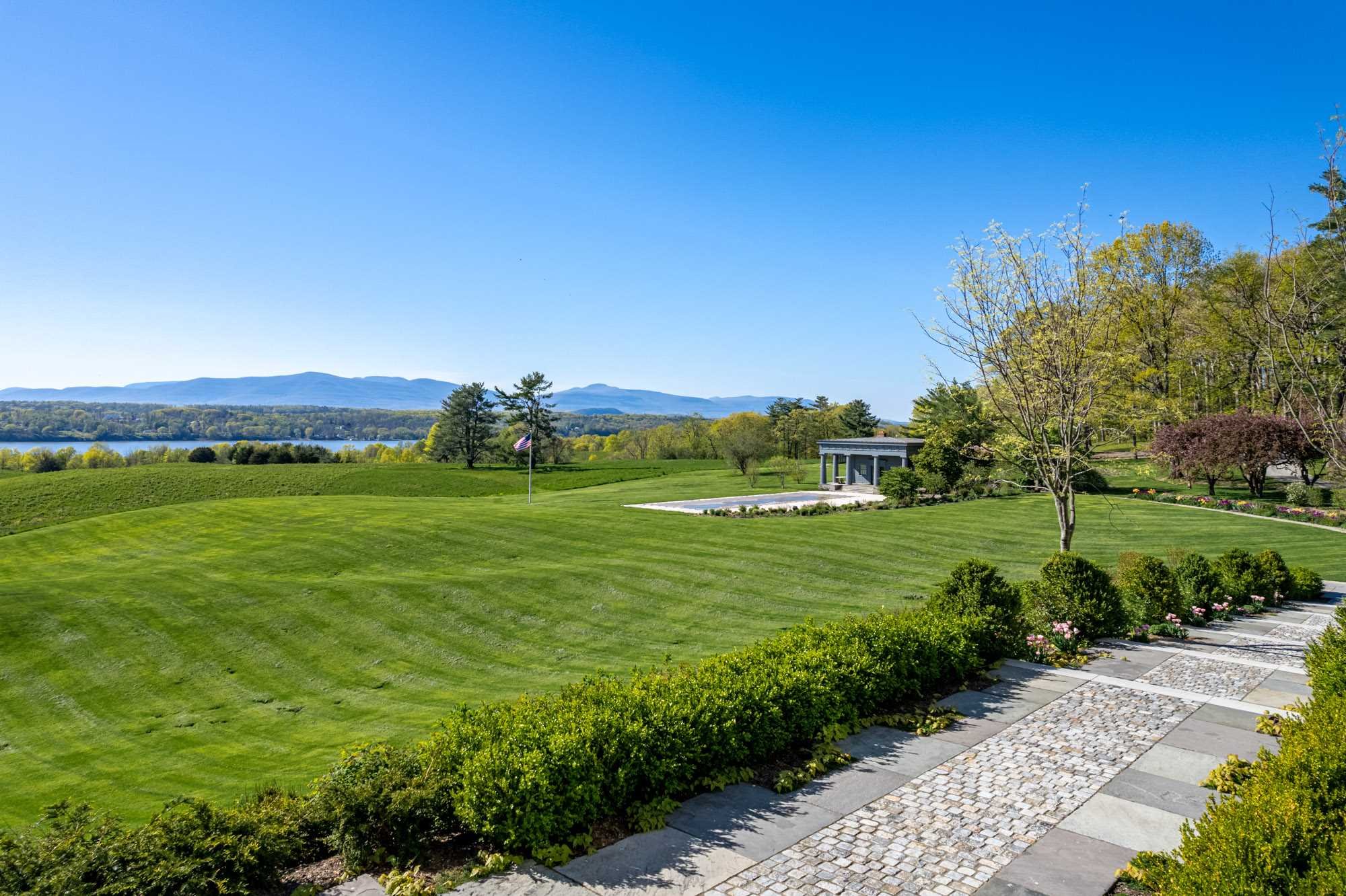 124 Eden Knoll Red Hook, NY 12571 - Photo 29 of 40 a view of a grassy field with an trees