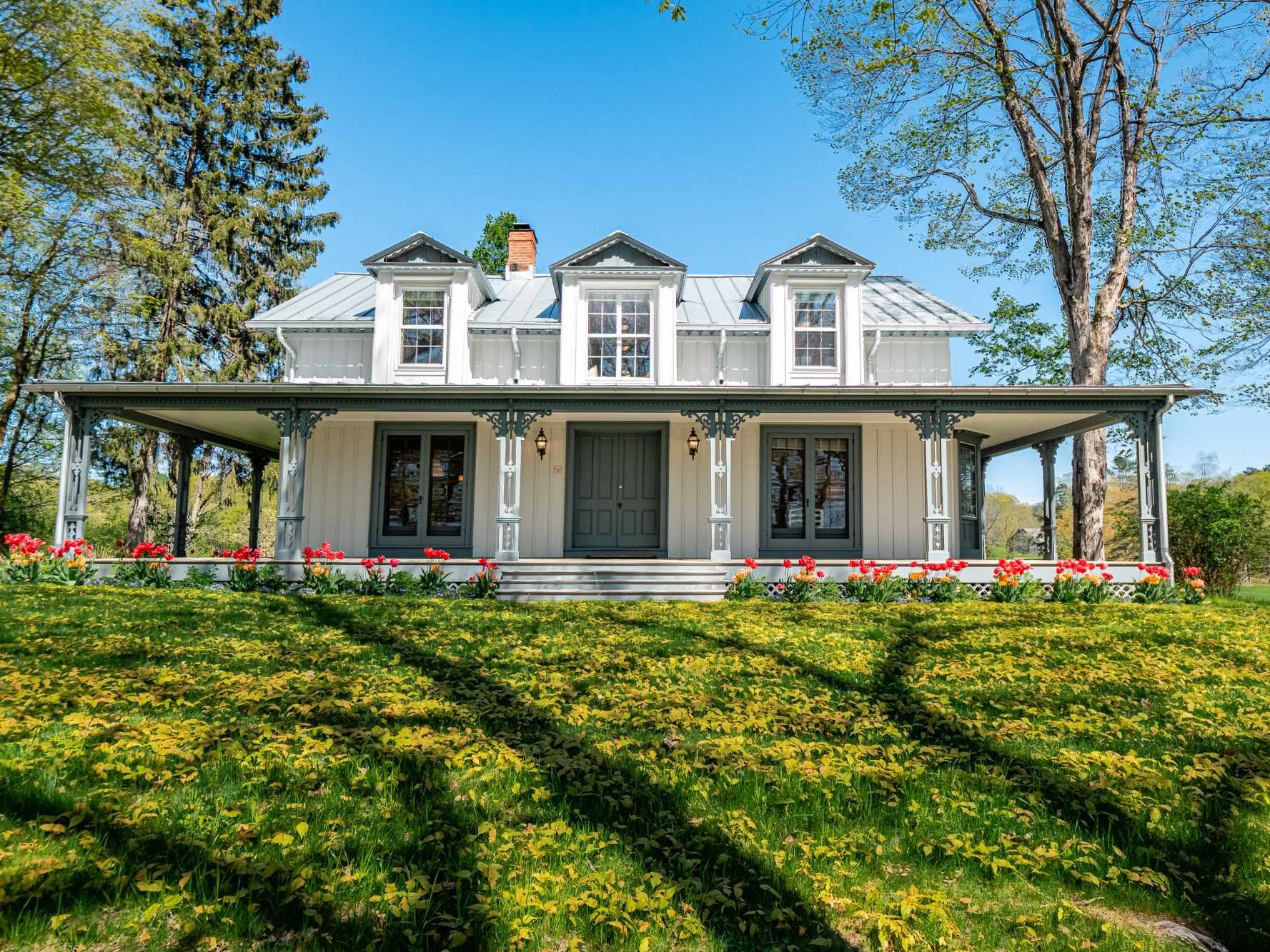 124 Eden Knoll Red Hook, NY 12571 - Photo 32 of 40 front view of a brick building with a yard