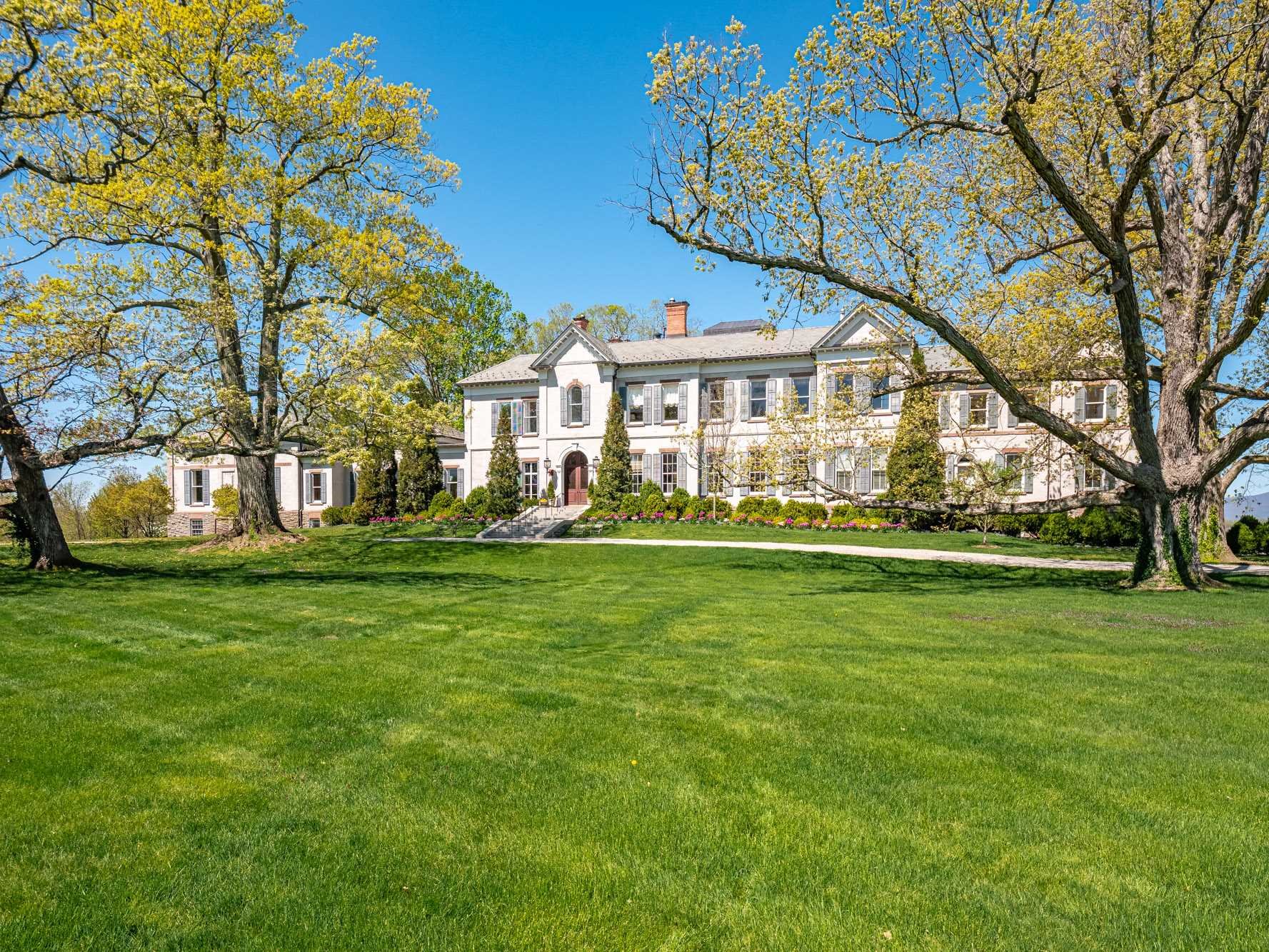 124 Eden Knoll Red Hook, NY 12571 - Photo 4 of 40 a front view of a house with a garden