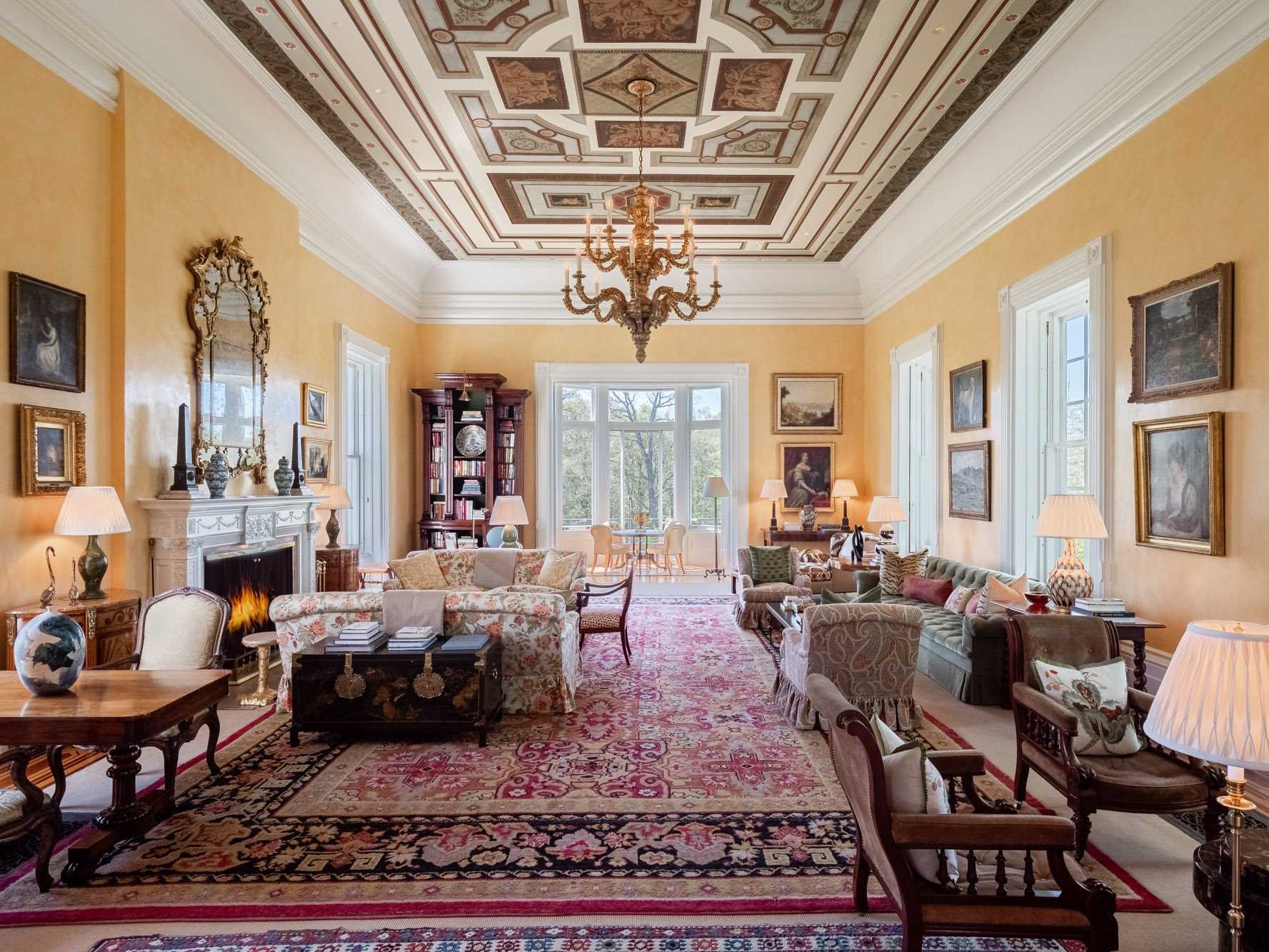 124 Eden Knoll Red Hook, NY 12571 - Photo 9 of 40 a living room with furniture chandelier and a large window