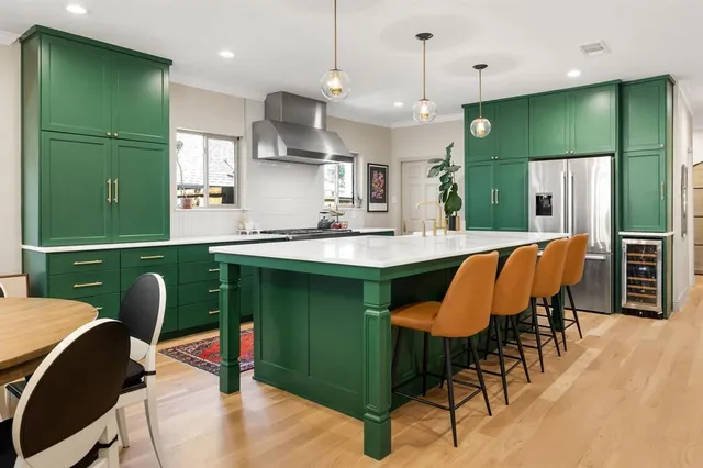a kitchen with a stove and a sink
