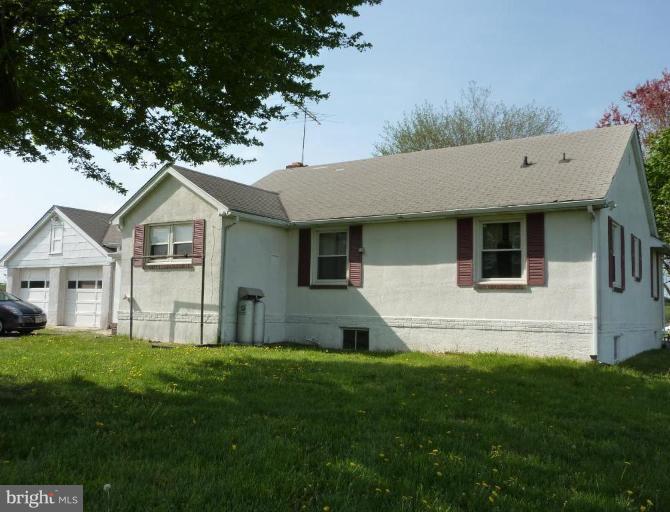 4307 Forge Road Perry Hall, MD 21128 - Photo 3 of 30 a house that is sitting in the grass