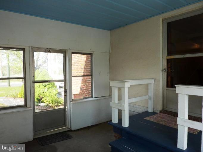 4307 Forge Road Perry Hall, MD 21128 - Photo 21 of 30 a room with wooden floor and windows