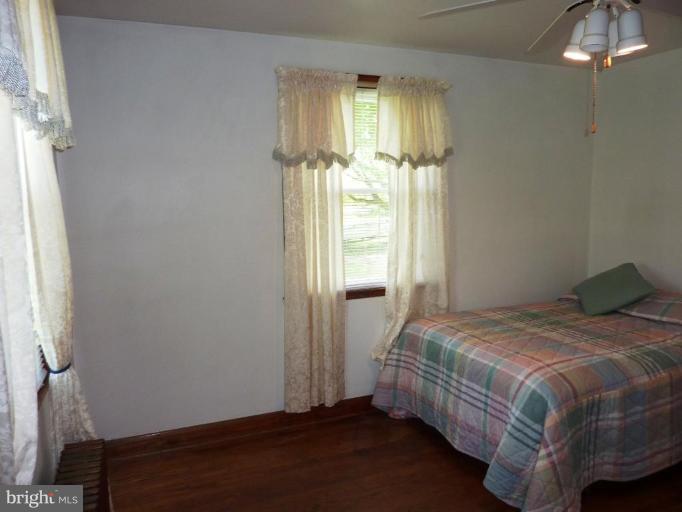 4307 Forge Road Perry Hall, MD 21128 - Photo 23 of 30 a bedroom with a bed and a window
