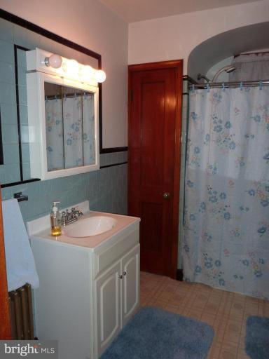 4307 Forge Road Perry Hall, MD 21128 - Photo 27 of 30 a bathroom with a sink and a mirror