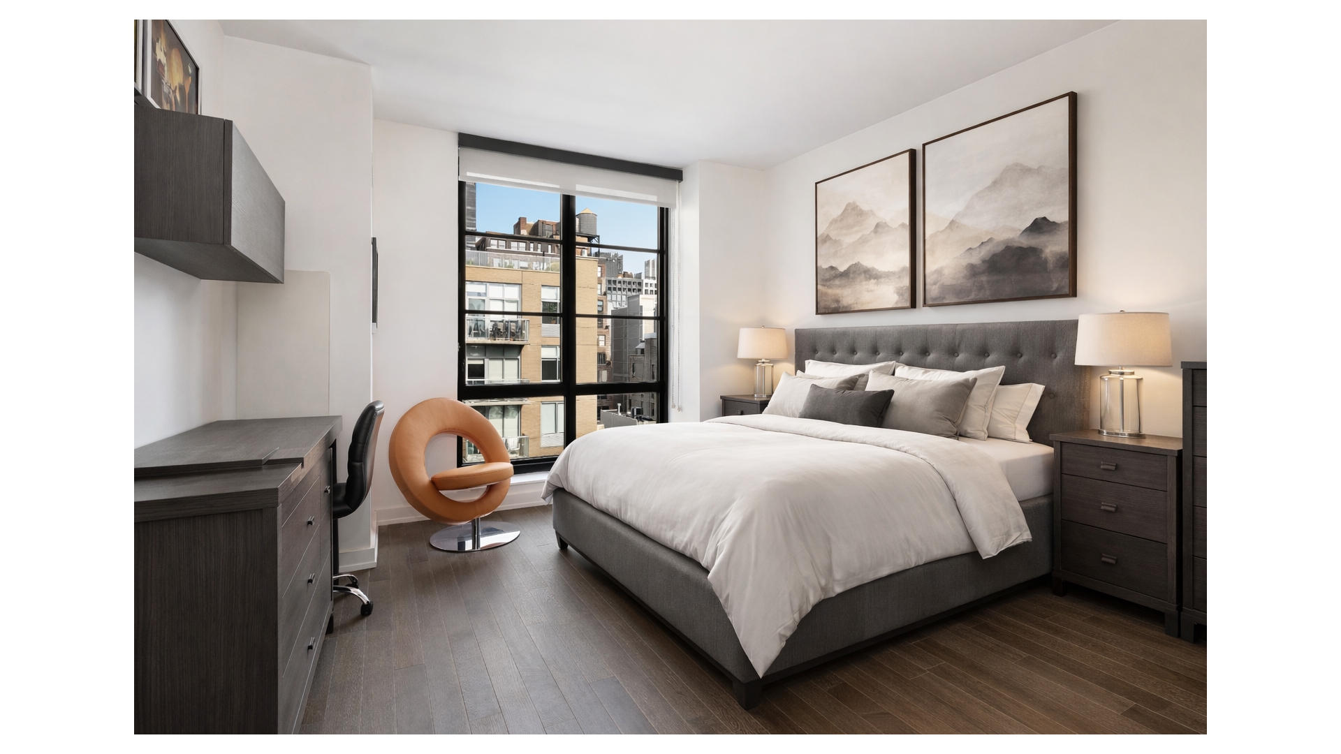 261 West 25th Street, Unit 11A Manhattan, NY 10001 - Photo 11 of 16 a bedroom with a bed a flat screen tv and a large window