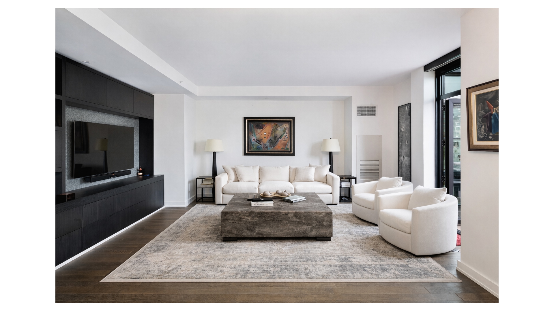261 West 25th Street, Unit 11A Manhattan, NY 10001 - Photo 3 of 16 a living room with furniture rug and window