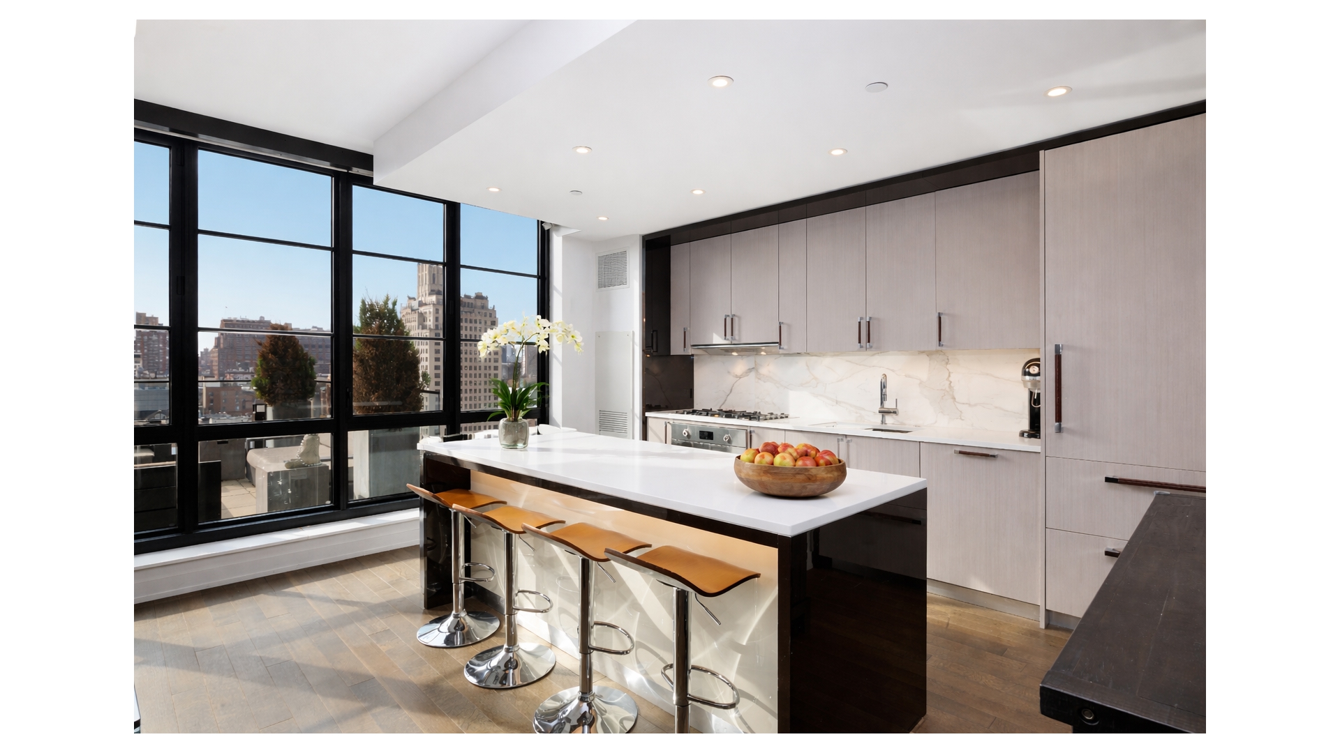 261 West 25th Street, Unit 11A Manhattan, NY 10001 - Photo 5 of 16 a kitchen with a sink stove and cabinets