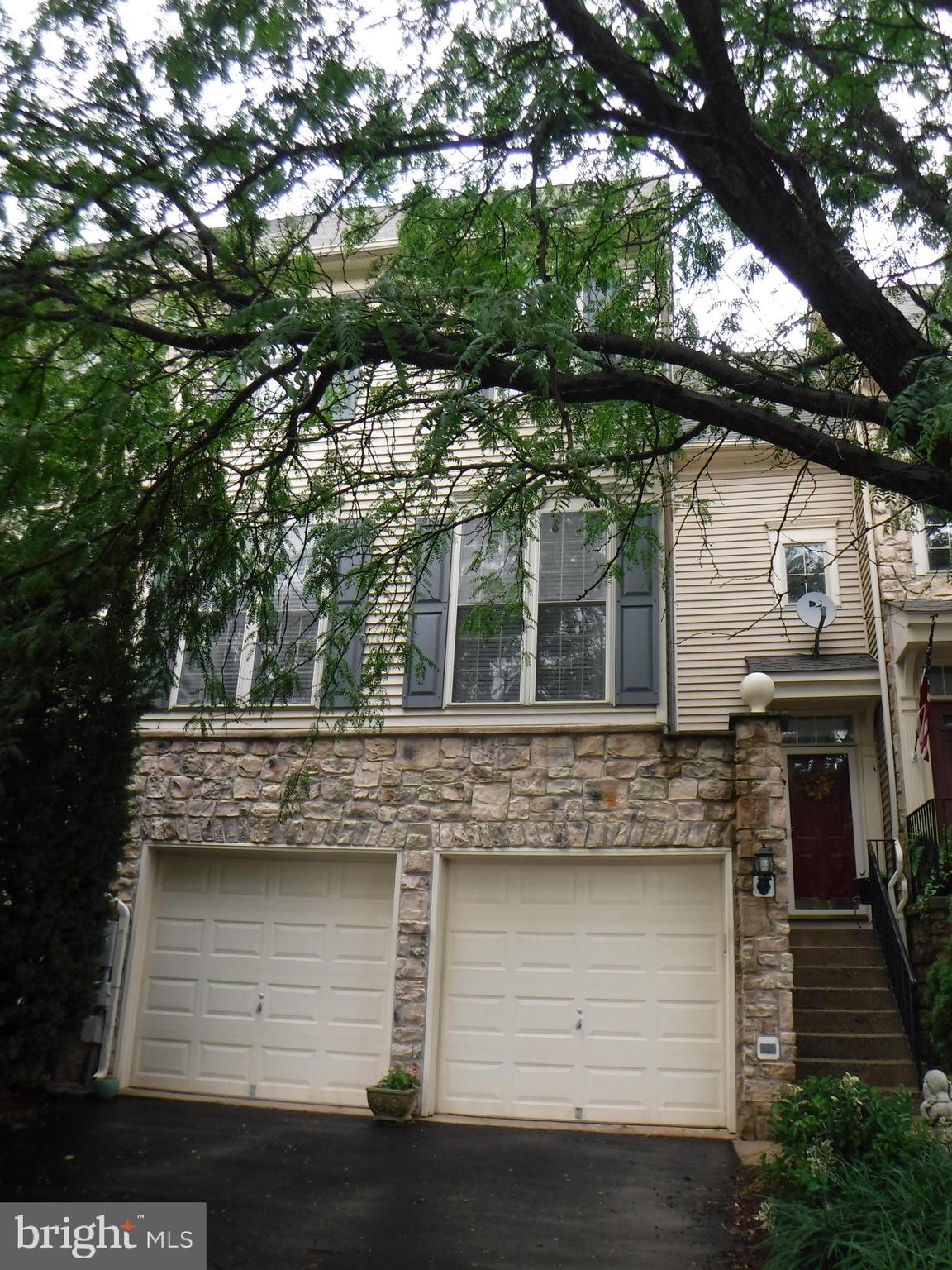 2444 Rippling Brook Road Frederick, MD 21701 - Photo 2 of 49 a view of house with a tree