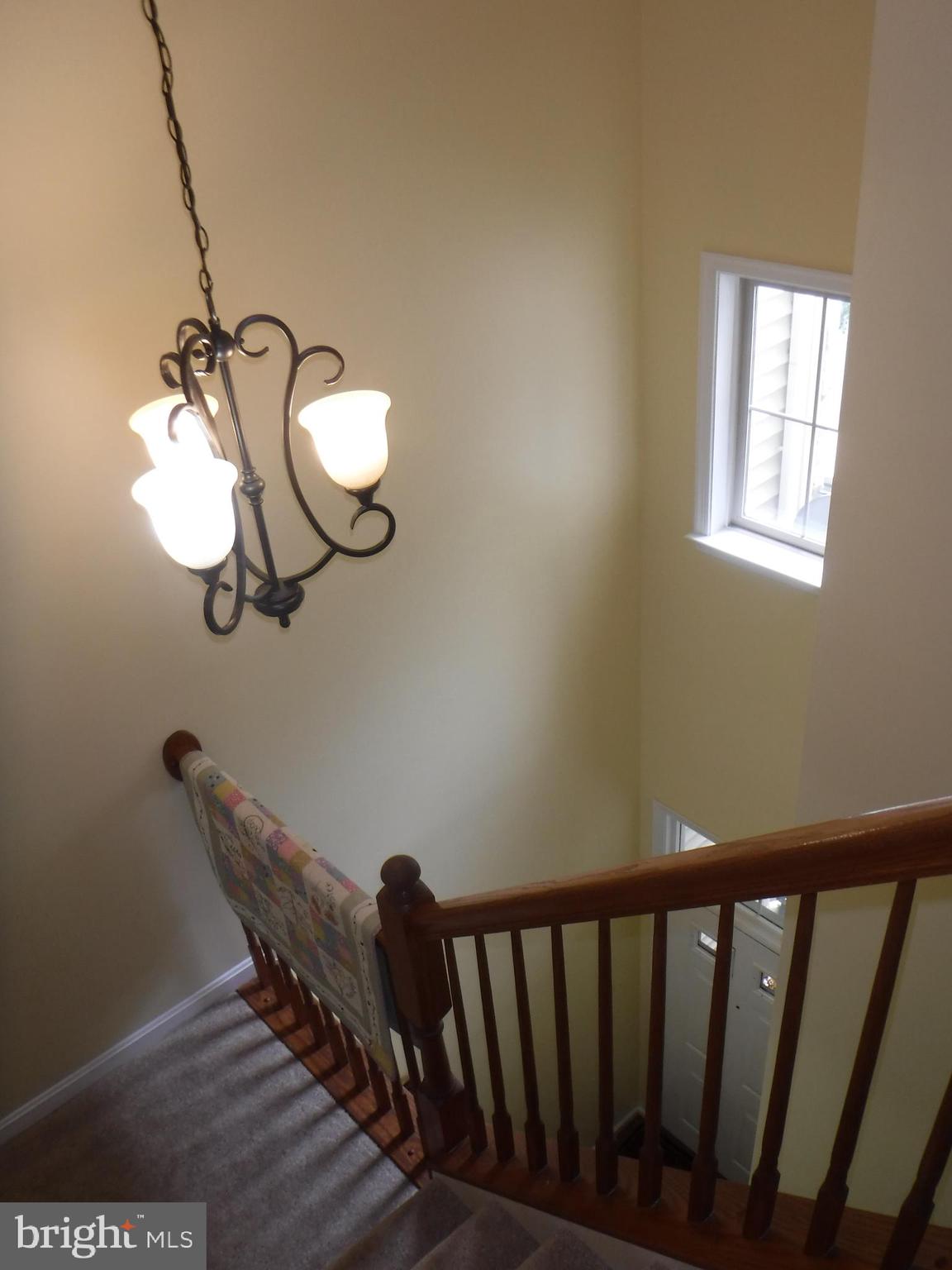 2444 Rippling Brook Road Frederick, MD 21701 - Photo 20 of 49 a view of a room with wooden floor and windows