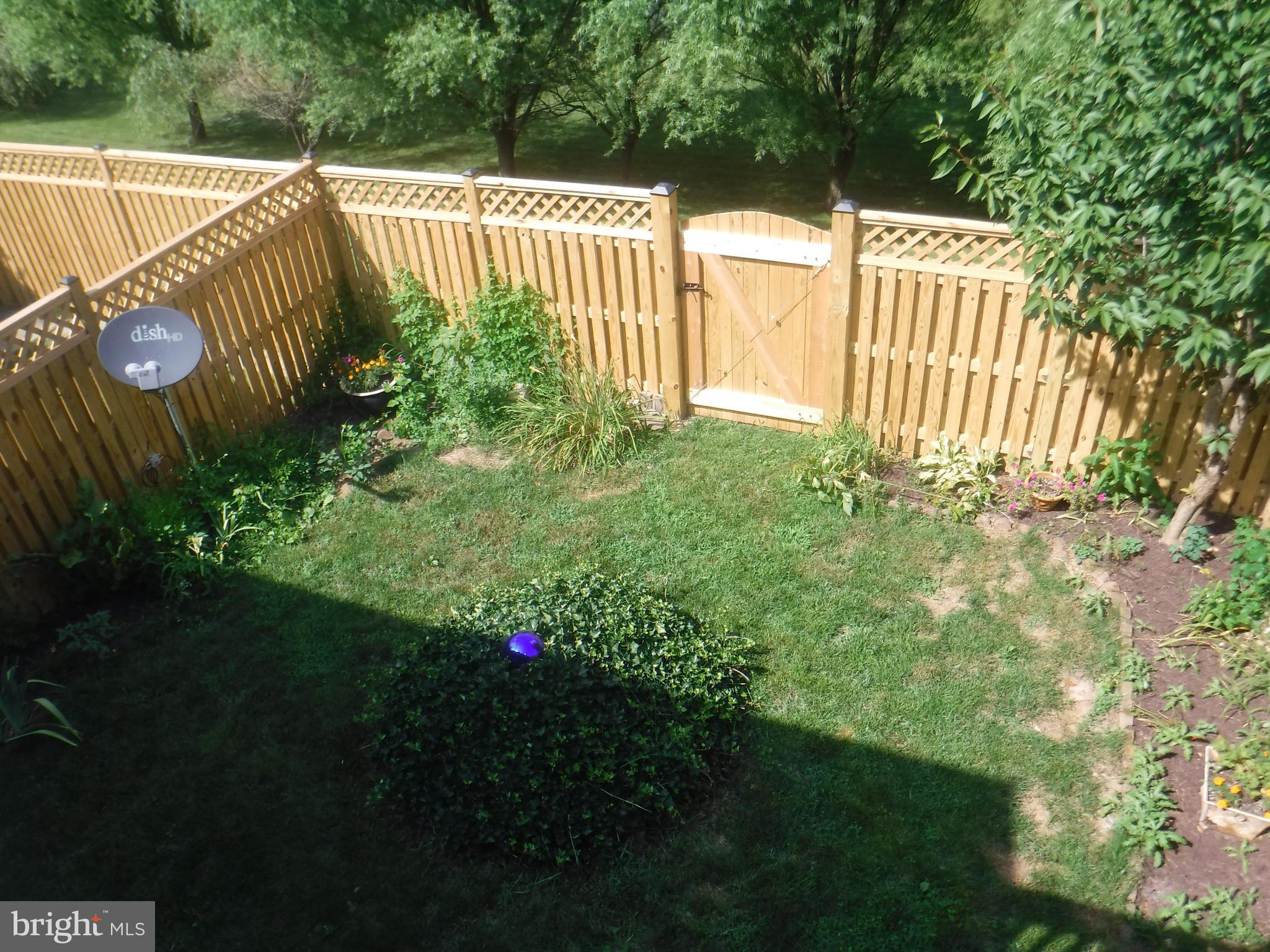 2444 Rippling Brook Road Frederick, MD 21701 - Photo 4 of 49 a view of a garden with deck