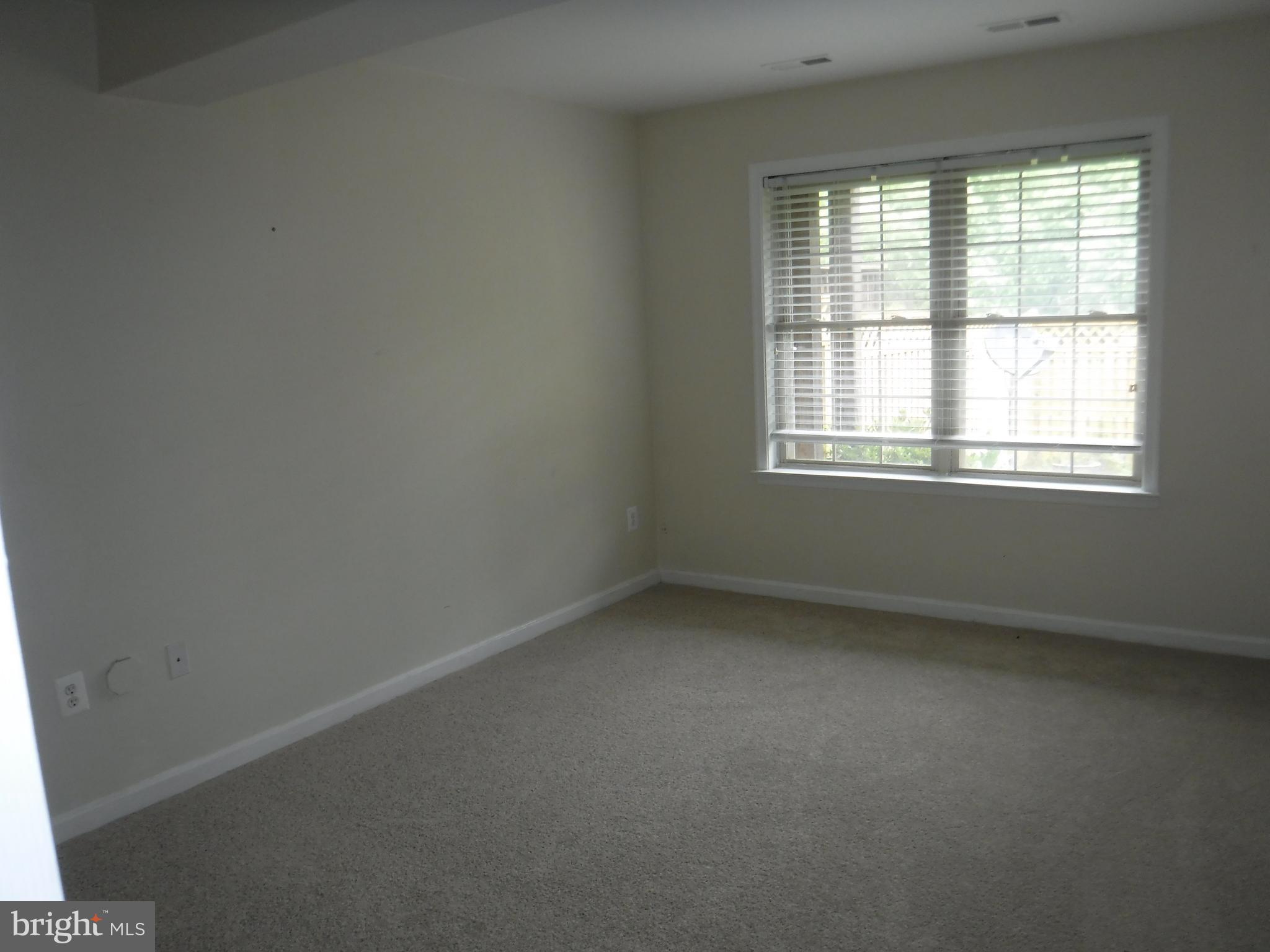 2444 Rippling Brook Road Frederick, MD 21701 - Photo 31 of 49 an empty room with a window