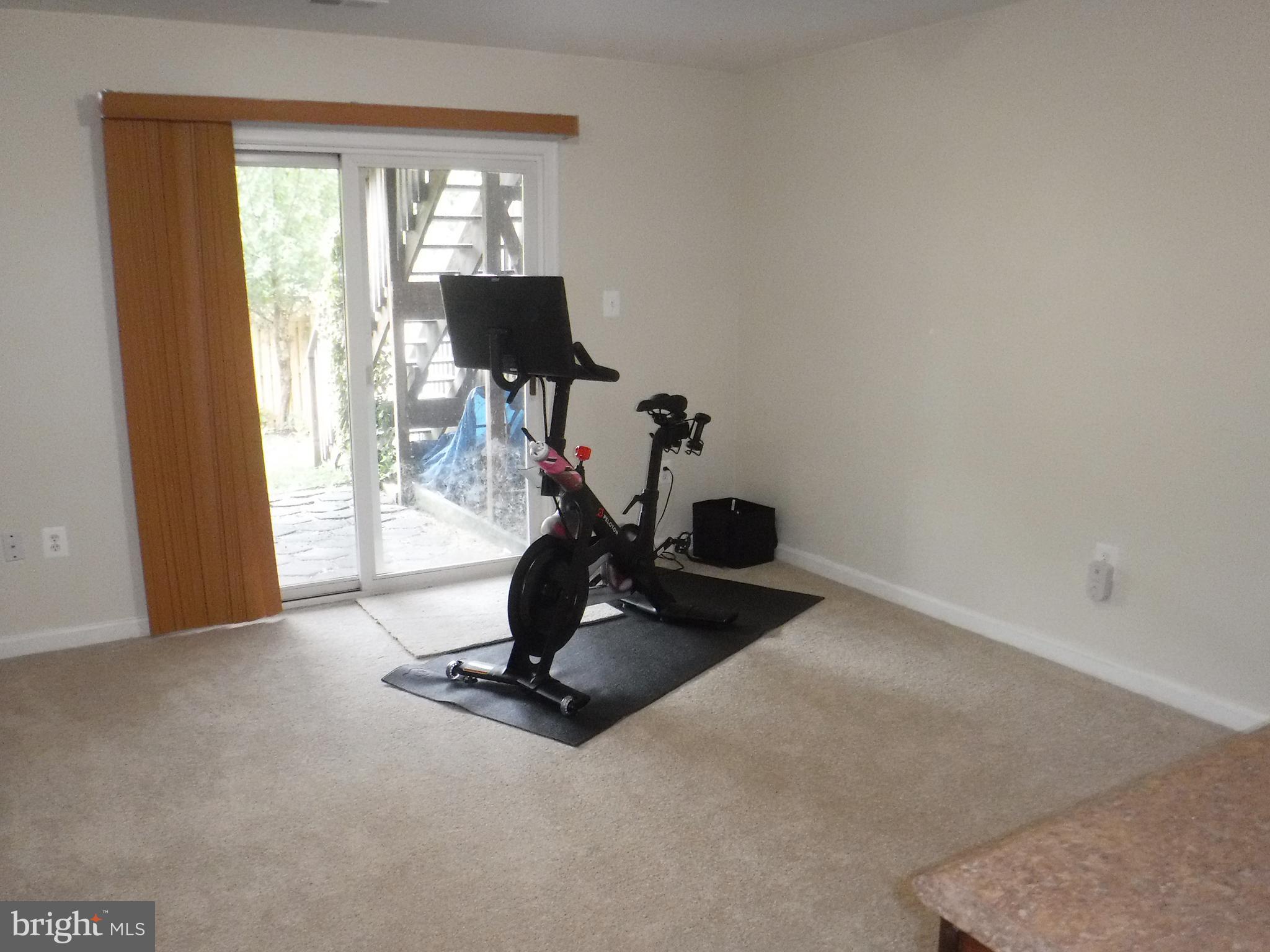2444 Rippling Brook Road Frederick, MD 21701 - Photo 33 of 49 a room with gym equipment and a large window
