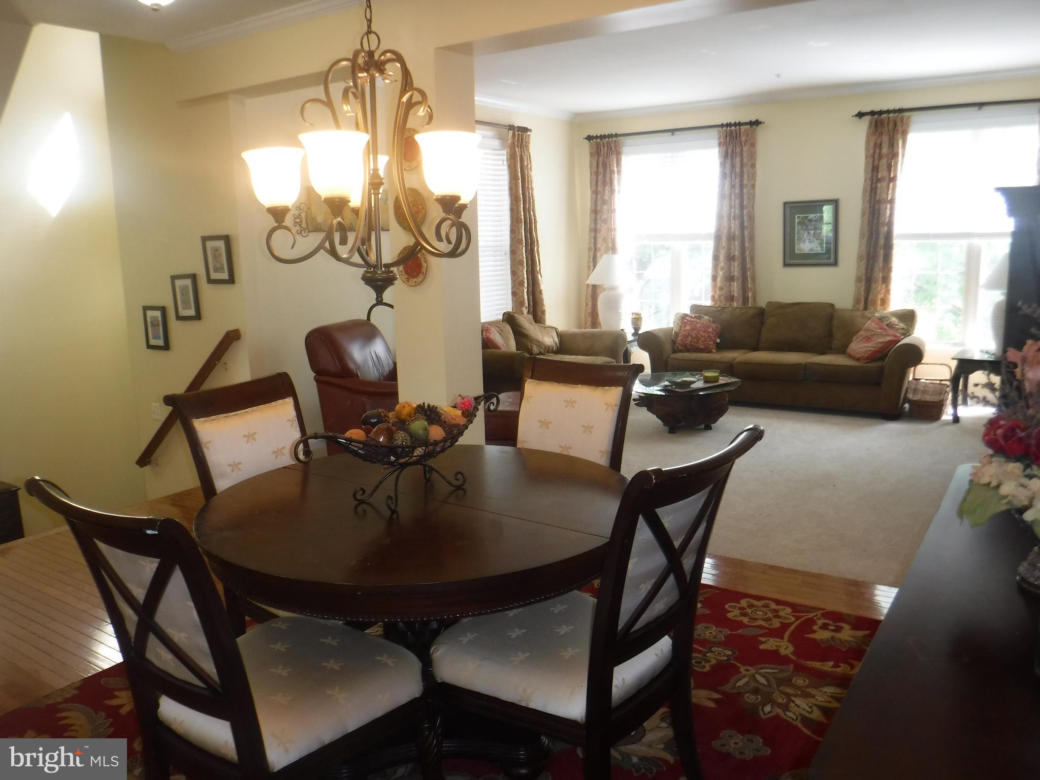 2444 Rippling Brook Road Frederick, MD 21701 - Photo 49 of 49 a view of a dining room with furniture and window