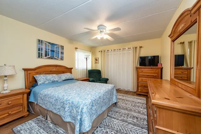 a bedroom with a bed and furniture