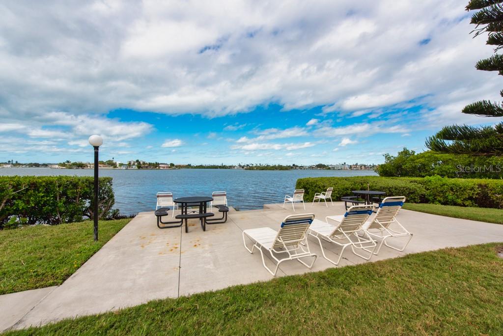 12760 Indian Rocks Road, Unit 601 Largo, FL 33774 - Photo 34 of 47 an outdoor view of a garden with furniture