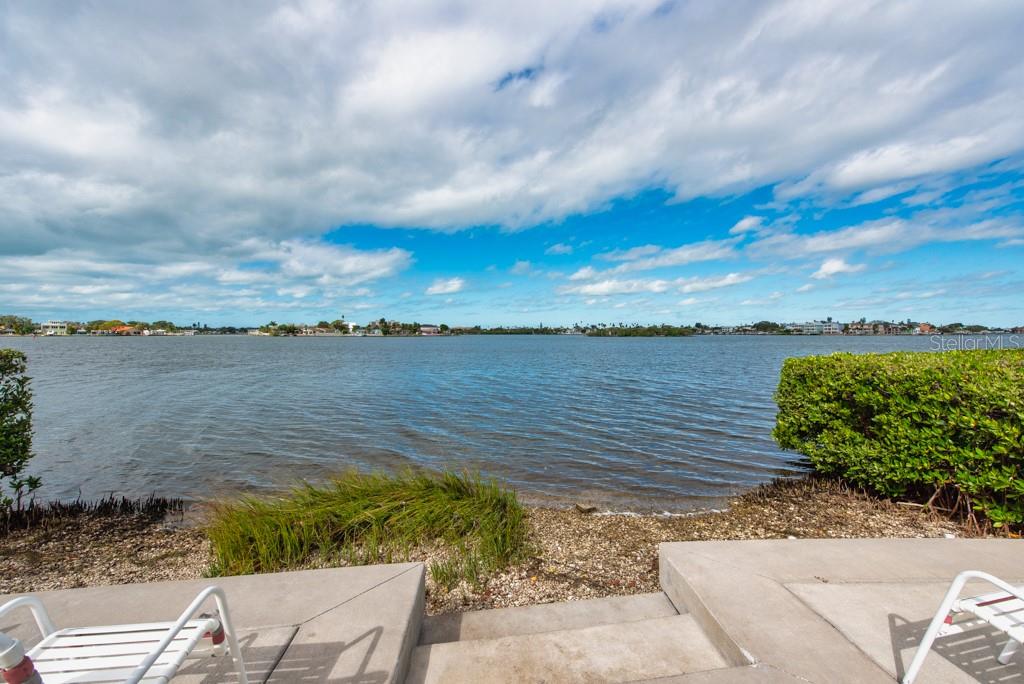 12760 Indian Rocks Road, Unit 601 Largo, FL 33774 - Photo 35 of 47 a view of a lake from a yard