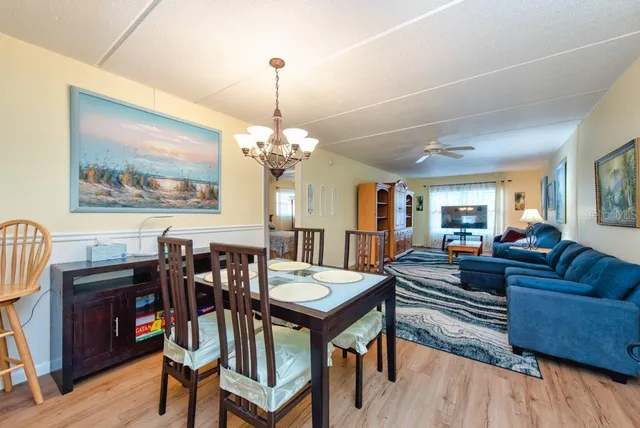 a view of a livingroom with furniture and window