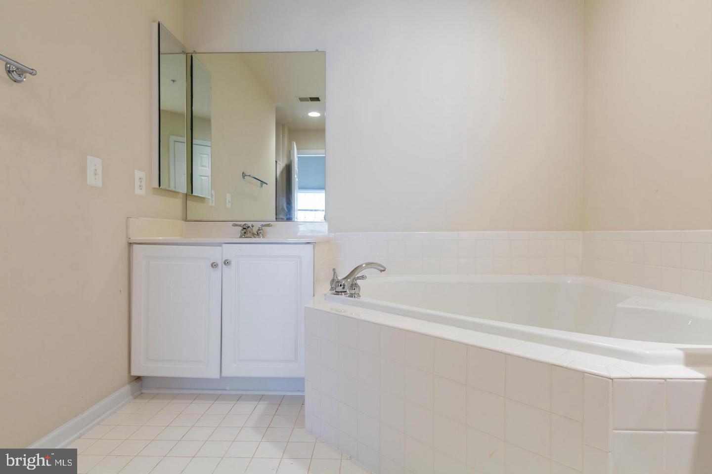 8857 Ashgrove House Lane Vienna, VA 22182 - Photo 16 of 34 Master bath with a soaking tub.