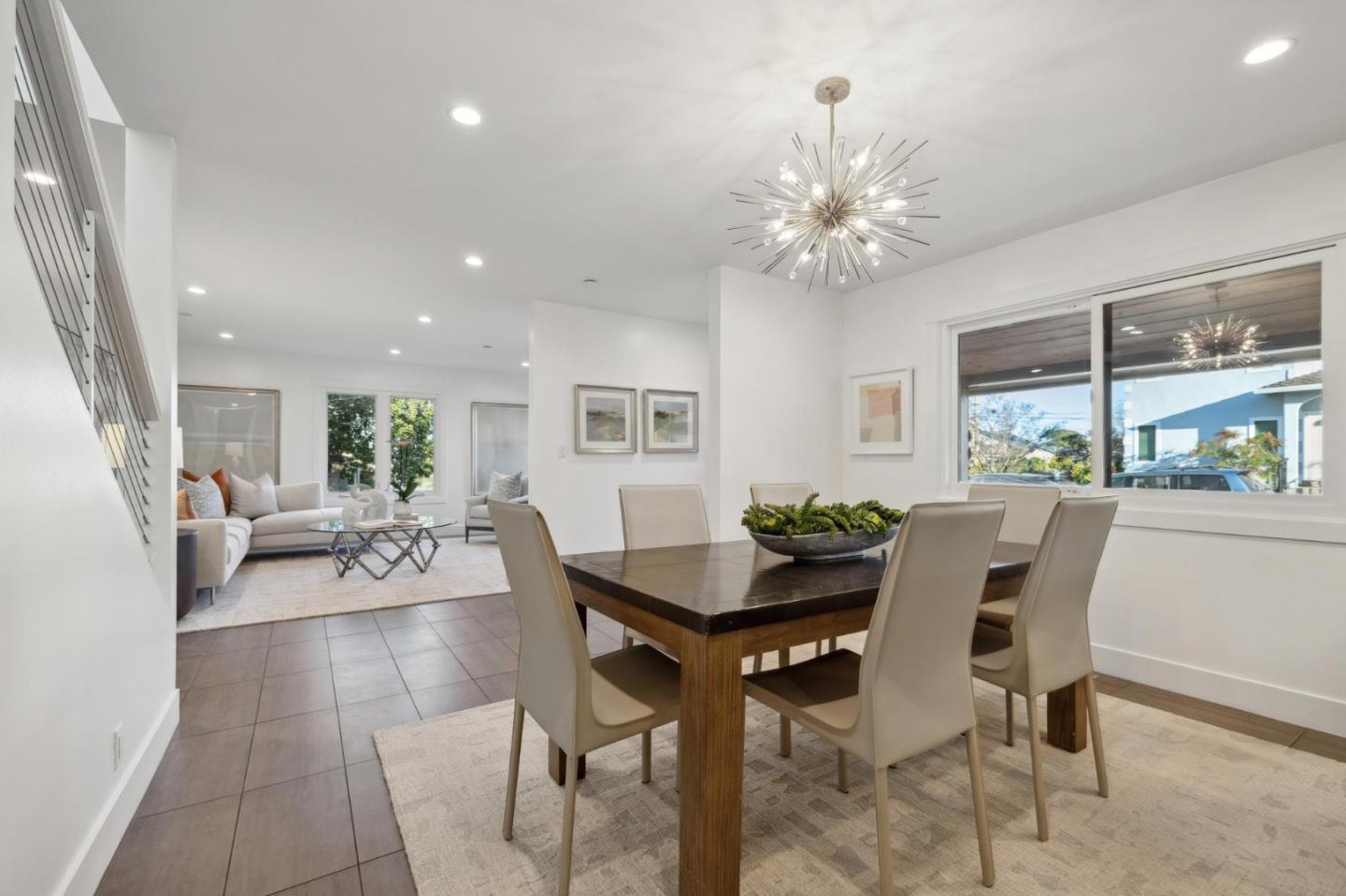 602 26th Avenue San Mateo, CA 94403 - Photo 9 of 41 a view of a dining room with furniture and a chandelier