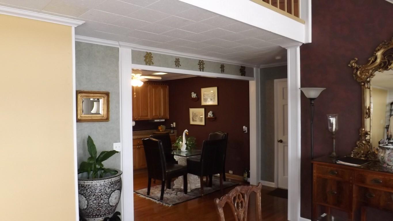 1008 Dreamland Road Spring City, TN 37381 - Photo 17 of 40 view into eat in kitchen from dining are