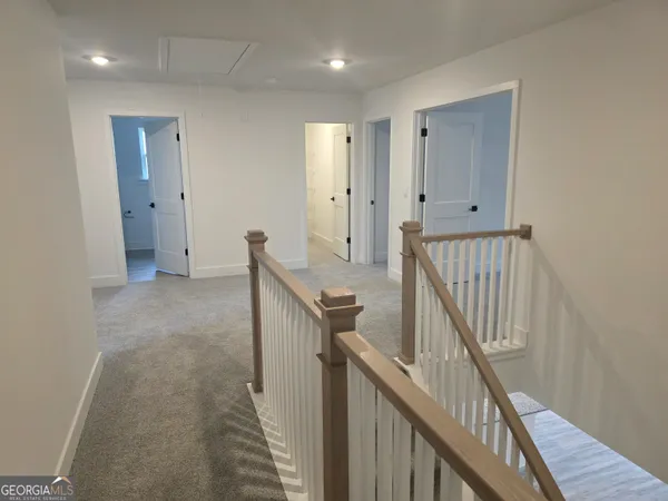 a view of hallway with stairs