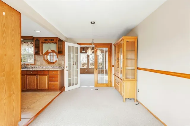 a spacious bathroom with a tub and shower