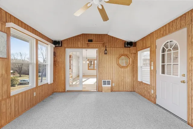 a view of a hallway with windows