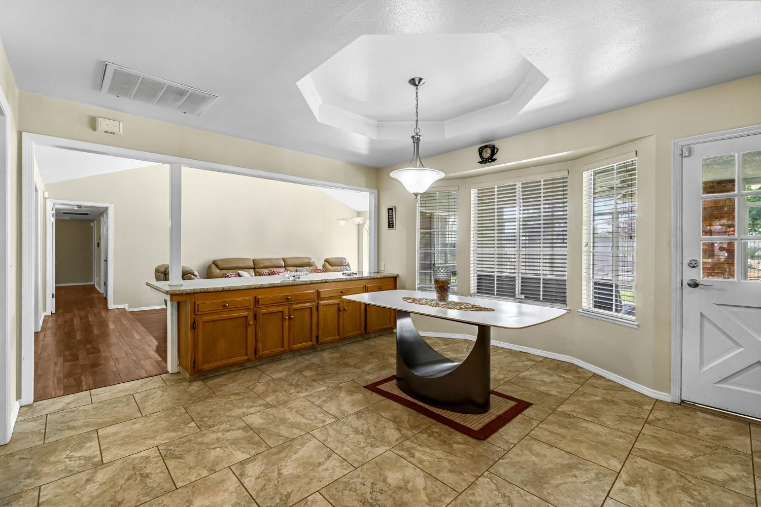2436 Trevor Court Madera, CA 93637 - Photo 14 of 57 a living room with a large window