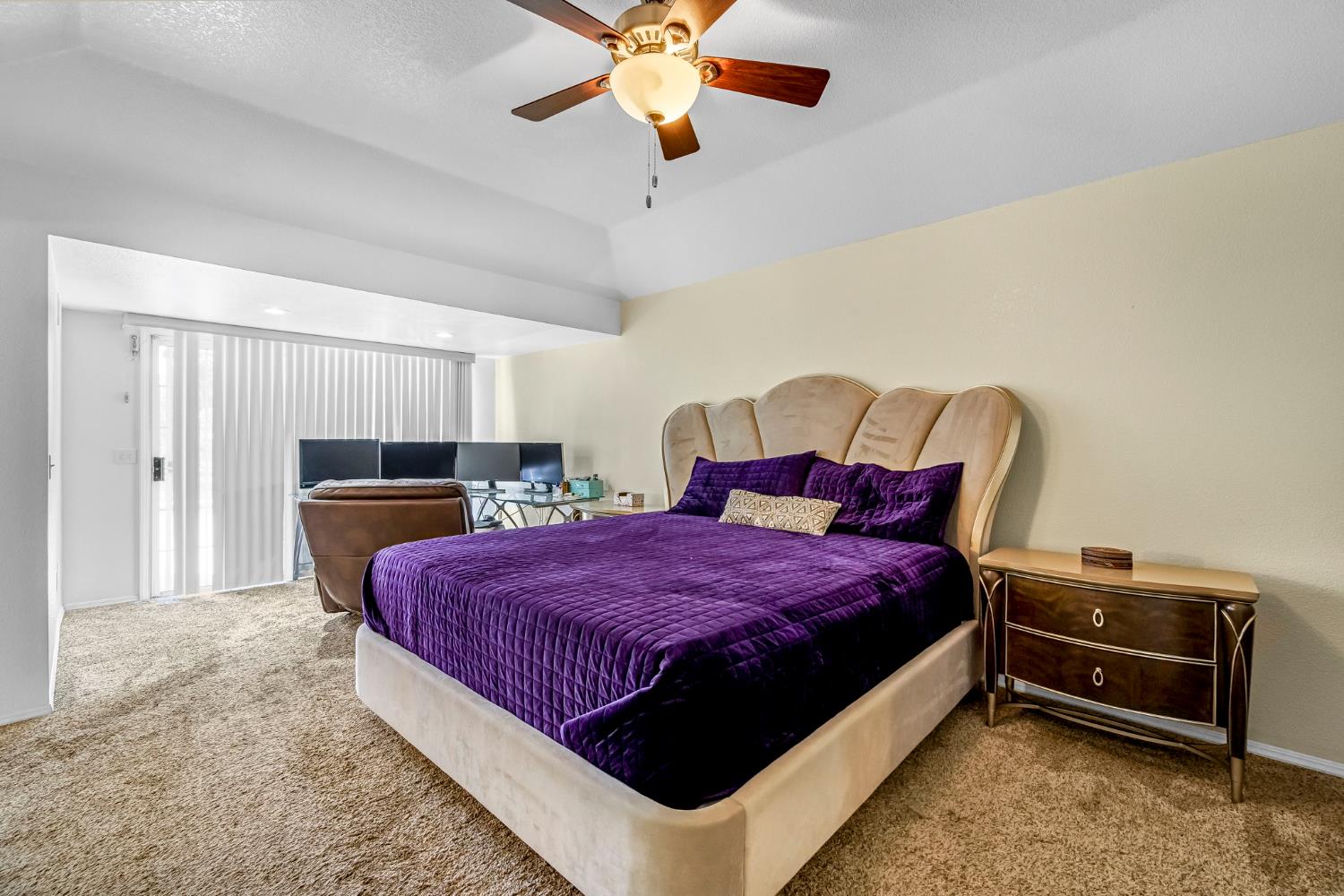 2436 Trevor Court Madera, CA 93637 - Photo 36 of 57 a spacious bedroom with a bed and a chandelier
