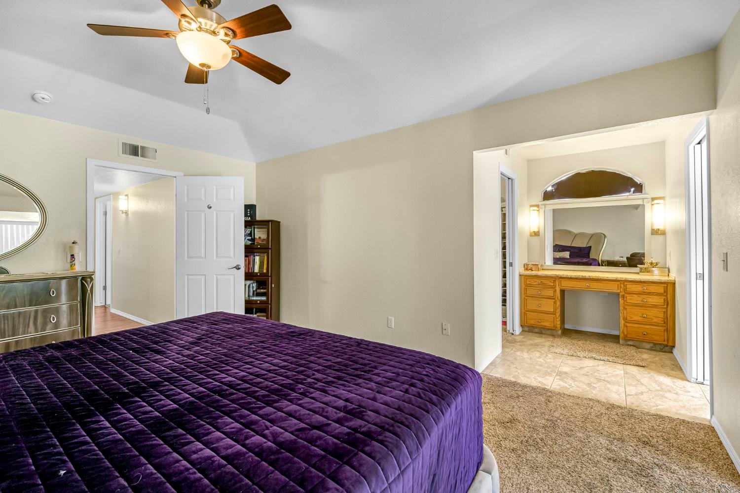 2436 Trevor Court Madera, CA 93637 - Photo 37 of 57 a bedroom with a bed and a view of kitchen