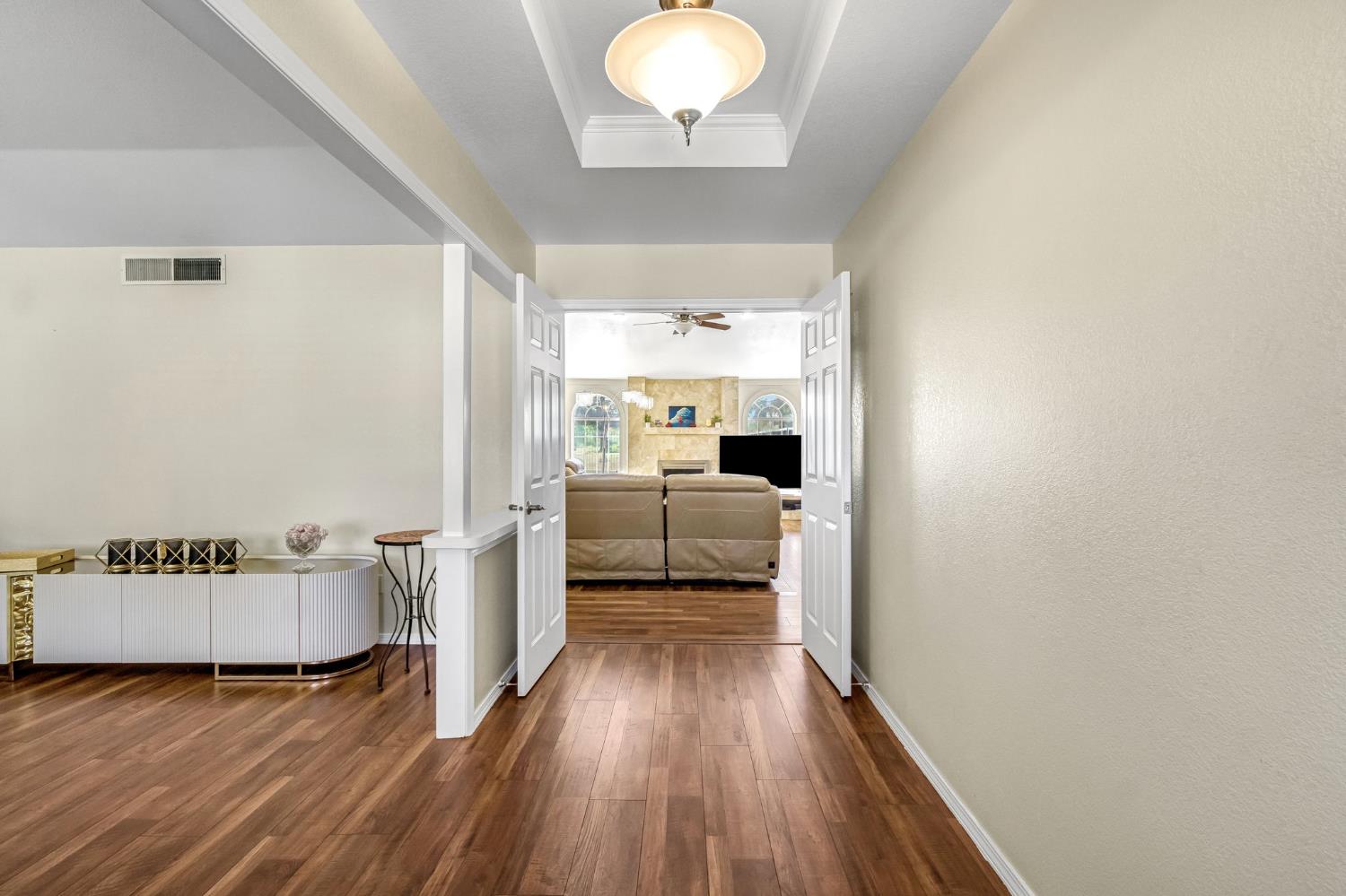 2436 Trevor Court Madera, CA 93637 - Photo 6 of 57 a view of a bedroom with furniture wooden floor and window
