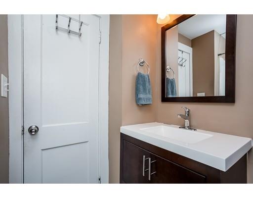 159 Powell Avenue Springfield, MA 01118 - Photo 15 of 30 a bathroom with a sink vanity and a mirror