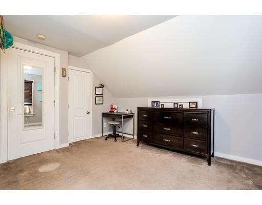 159 Powell Avenue Springfield, MA 01118 - Photo 18 of 30 a room with a dresser and a chair