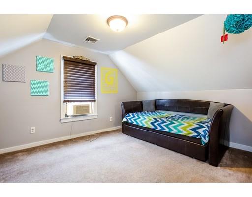 159 Powell Avenue Springfield, MA 01118 - Photo 19 of 30 a room with toys and wooden floor