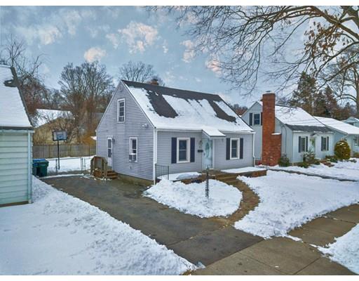 159 Powell Avenue Springfield, MA 01118 - Photo 2 of 30 a front view of a house with a yard