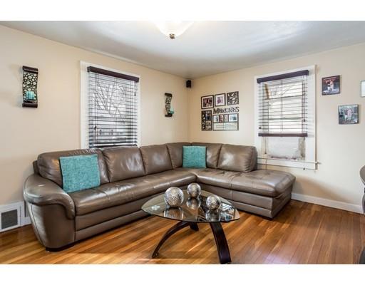 159 Powell Avenue Springfield, MA 01118 - Photo 4 of 30 a living room with furniture and a window